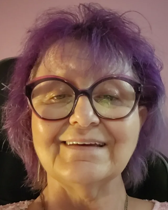 Tina, smiling warmly